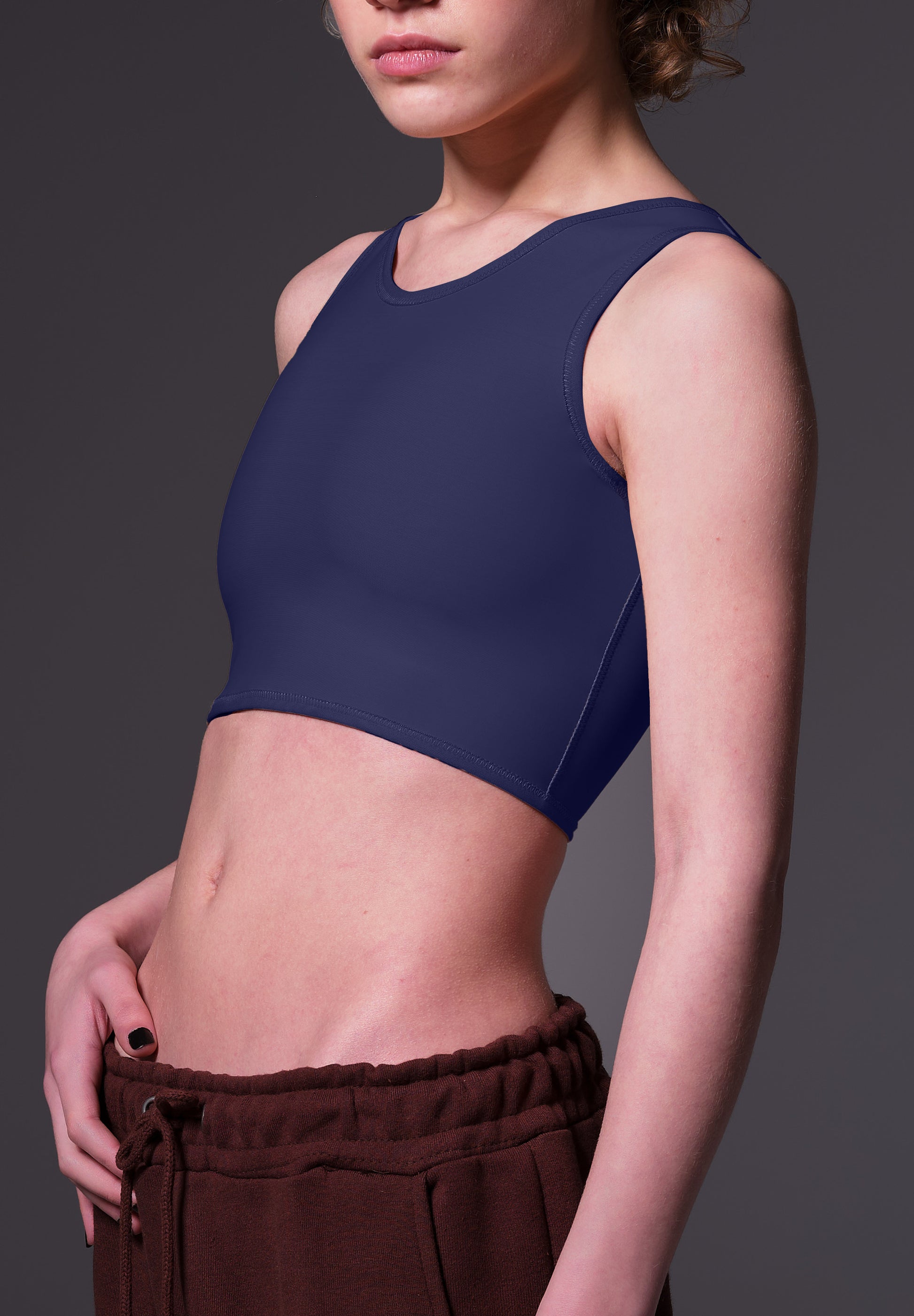 FtM trans fitted short chest binder dark blue side model LGBTQIA+