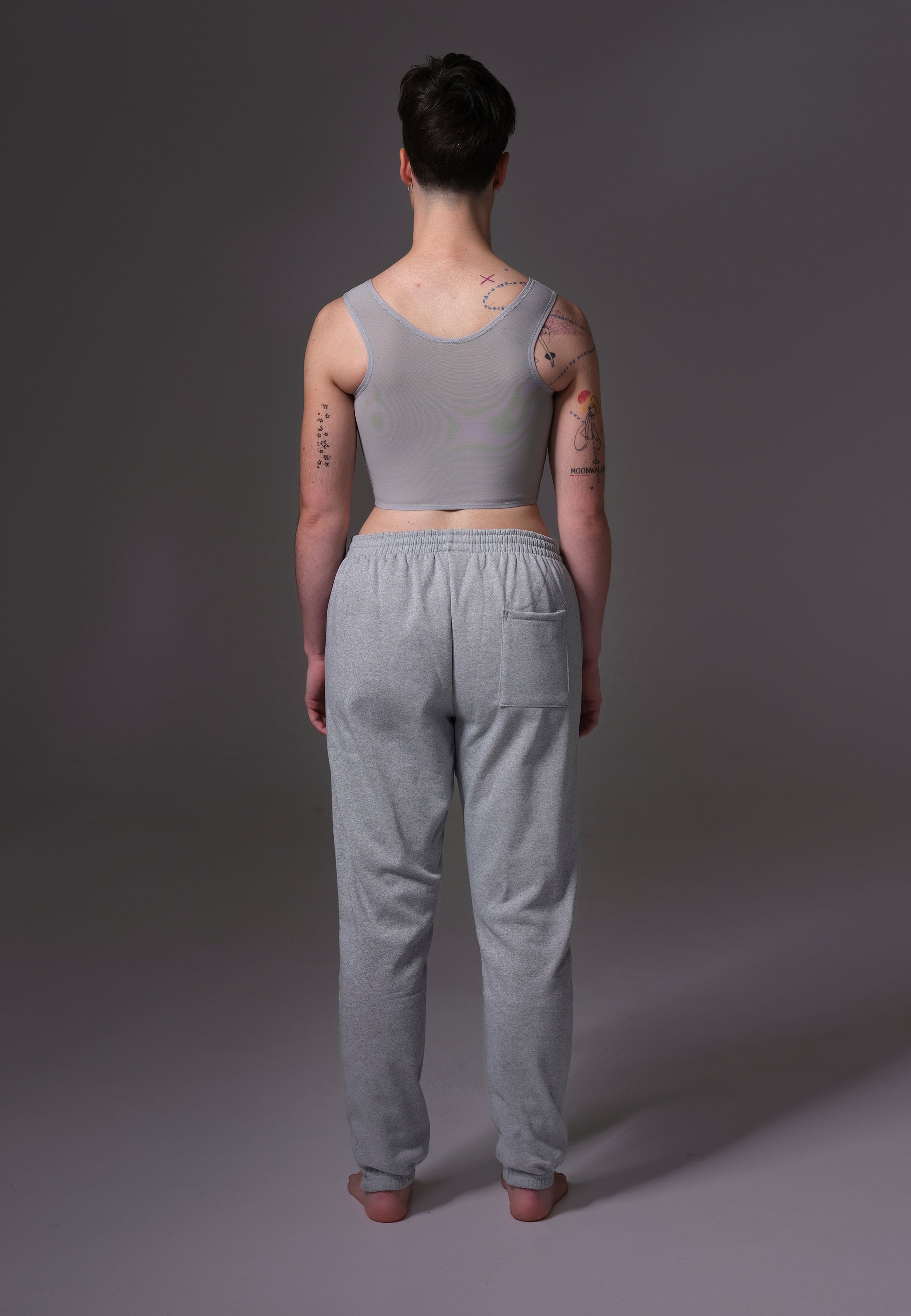 UNTAG ftm chest binder trans non binary underwear basic zipper grey model back 1