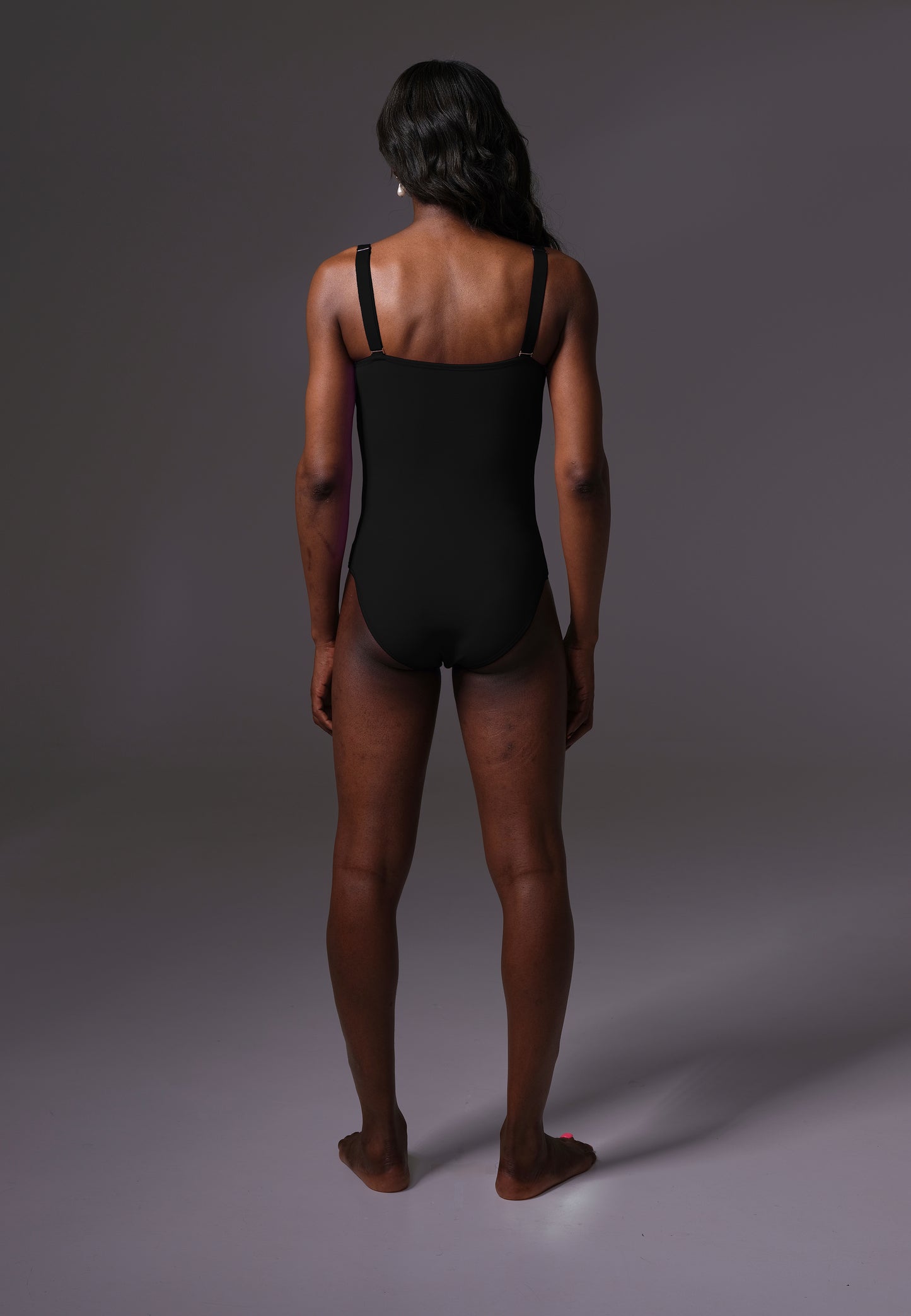 UNTAG MtF trans femme Strappy One Piece black prosthetic boobs back front model