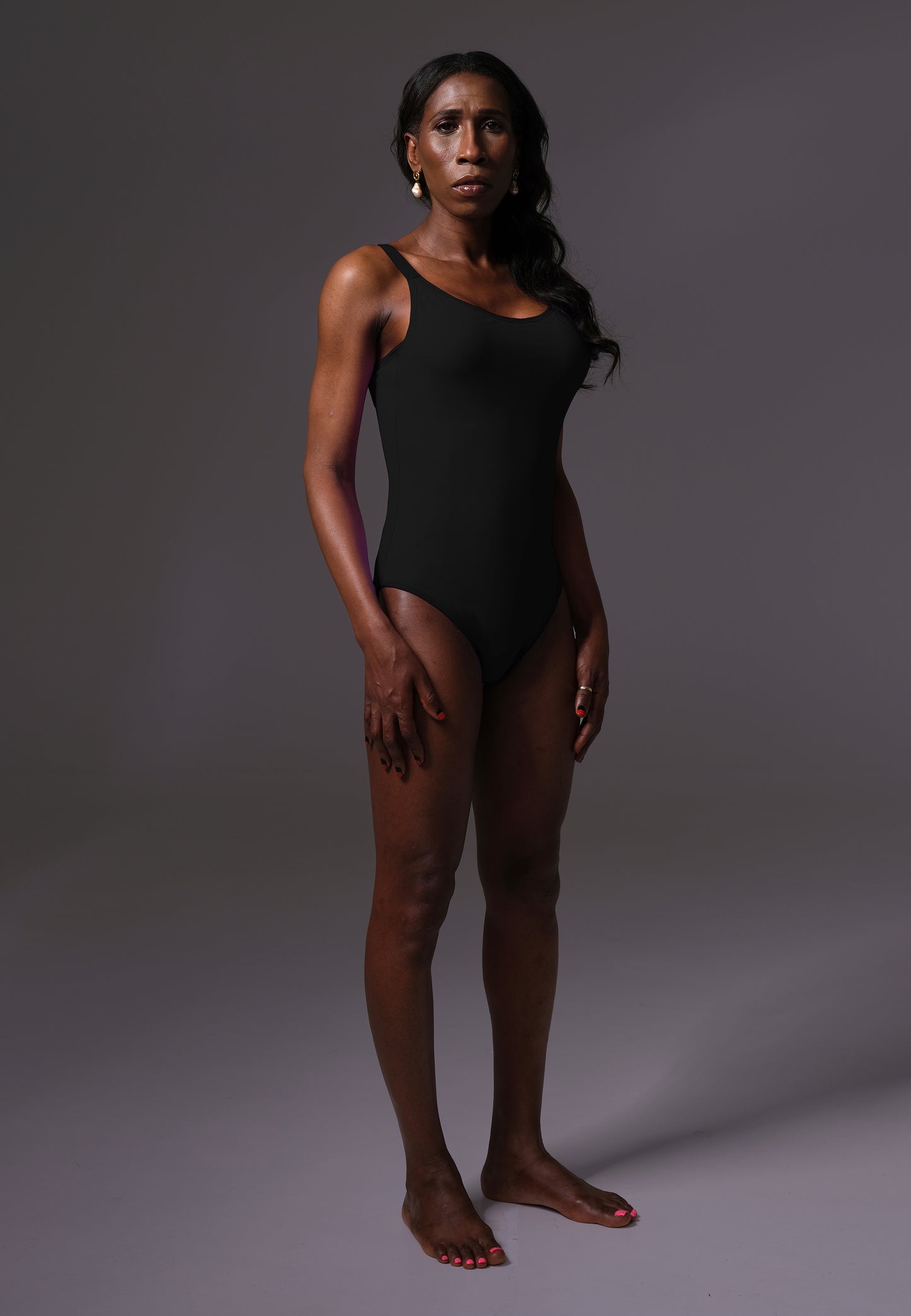UNTAG MtF trans femme Strappy One Piece black prosthetic boobs side front model
