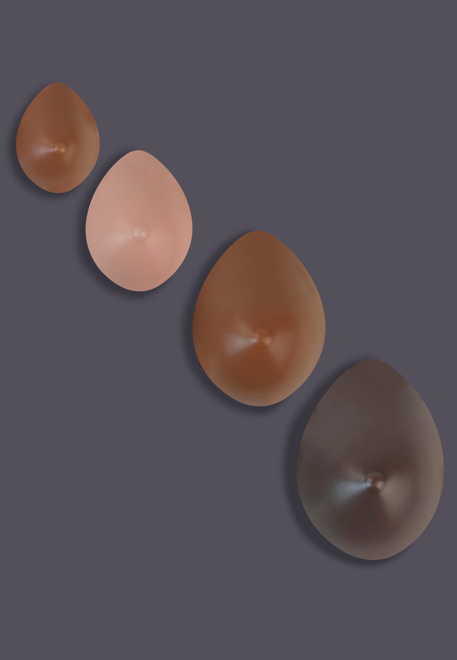 The Oval shaped Breast Prostheses in 4 colour - vanilla, caramel, chocolate - and 4 sizes