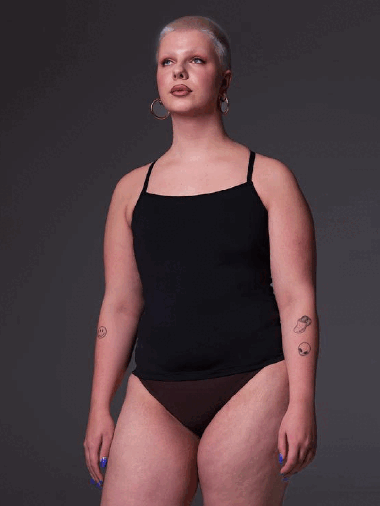 Sasha wears the brown slip