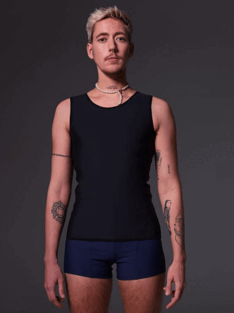 the swimtop binder in black is shown, a black top with a zipper on the back