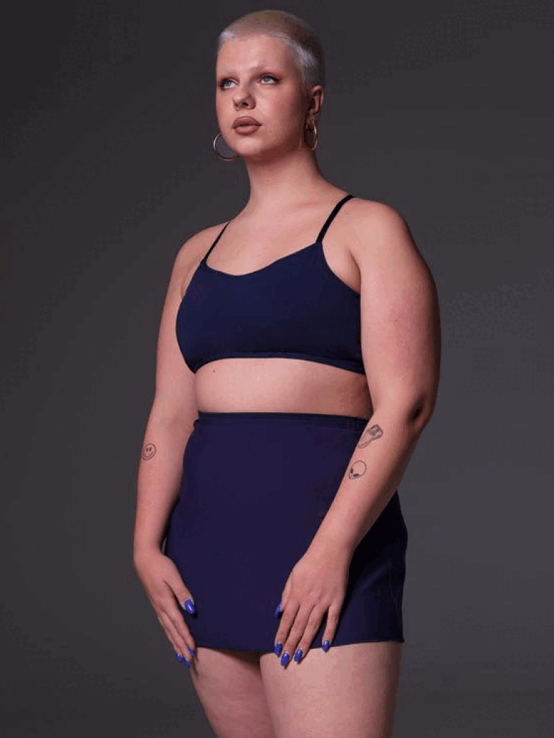Sasha shows off the Swim Skirt from three angles