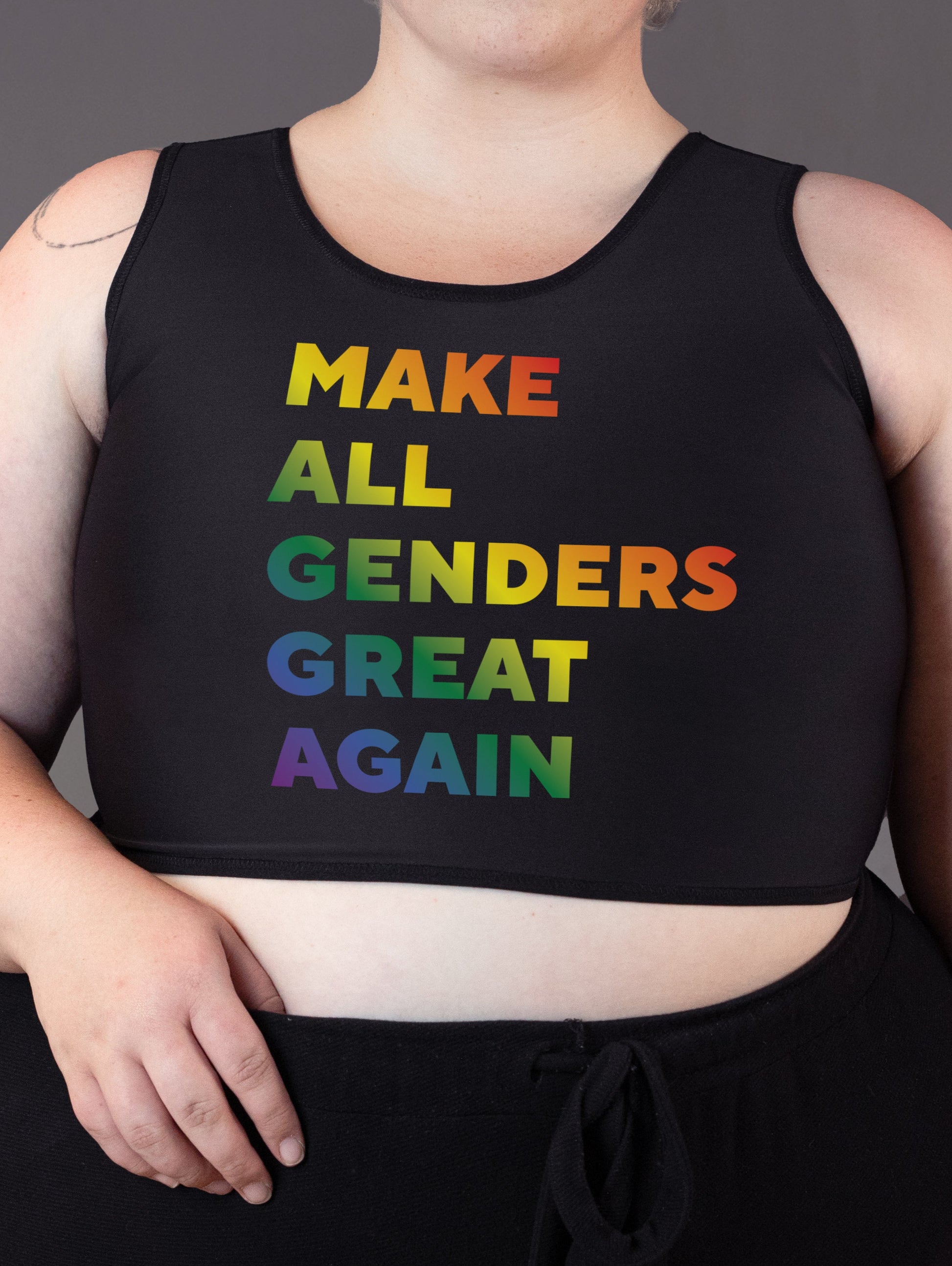 genderqueer model wearing an anti-trump binder that says 'Make all genders great again'