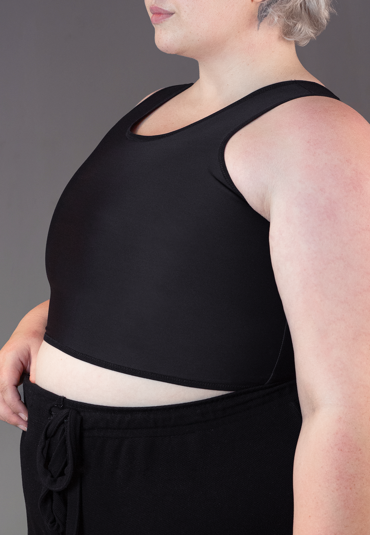 UNTAG FtM Trans masc non binary chest short binder extra strong black close up 1 