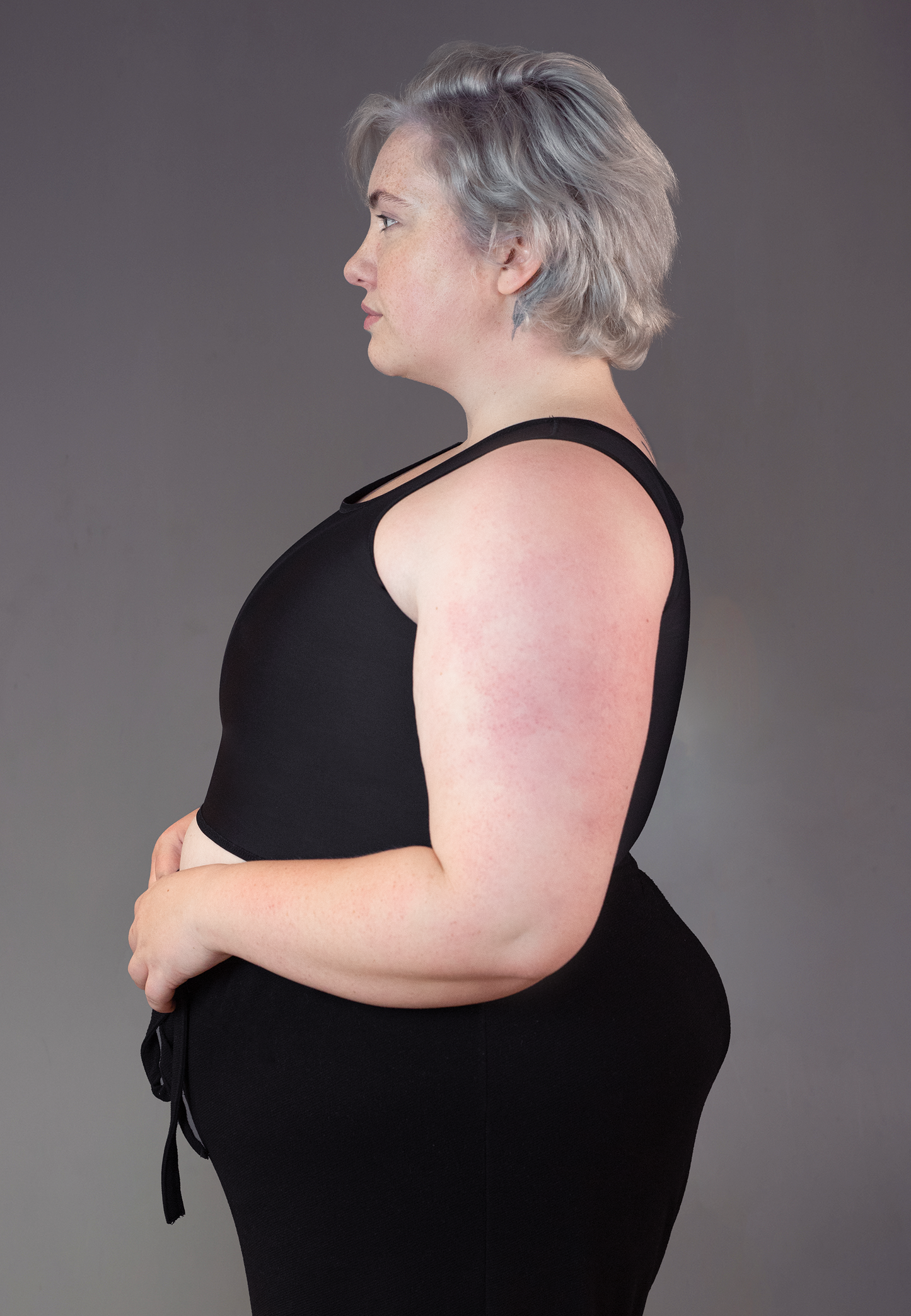 UNTAG FtM Trans masc non binary chest short binder extra strong black side