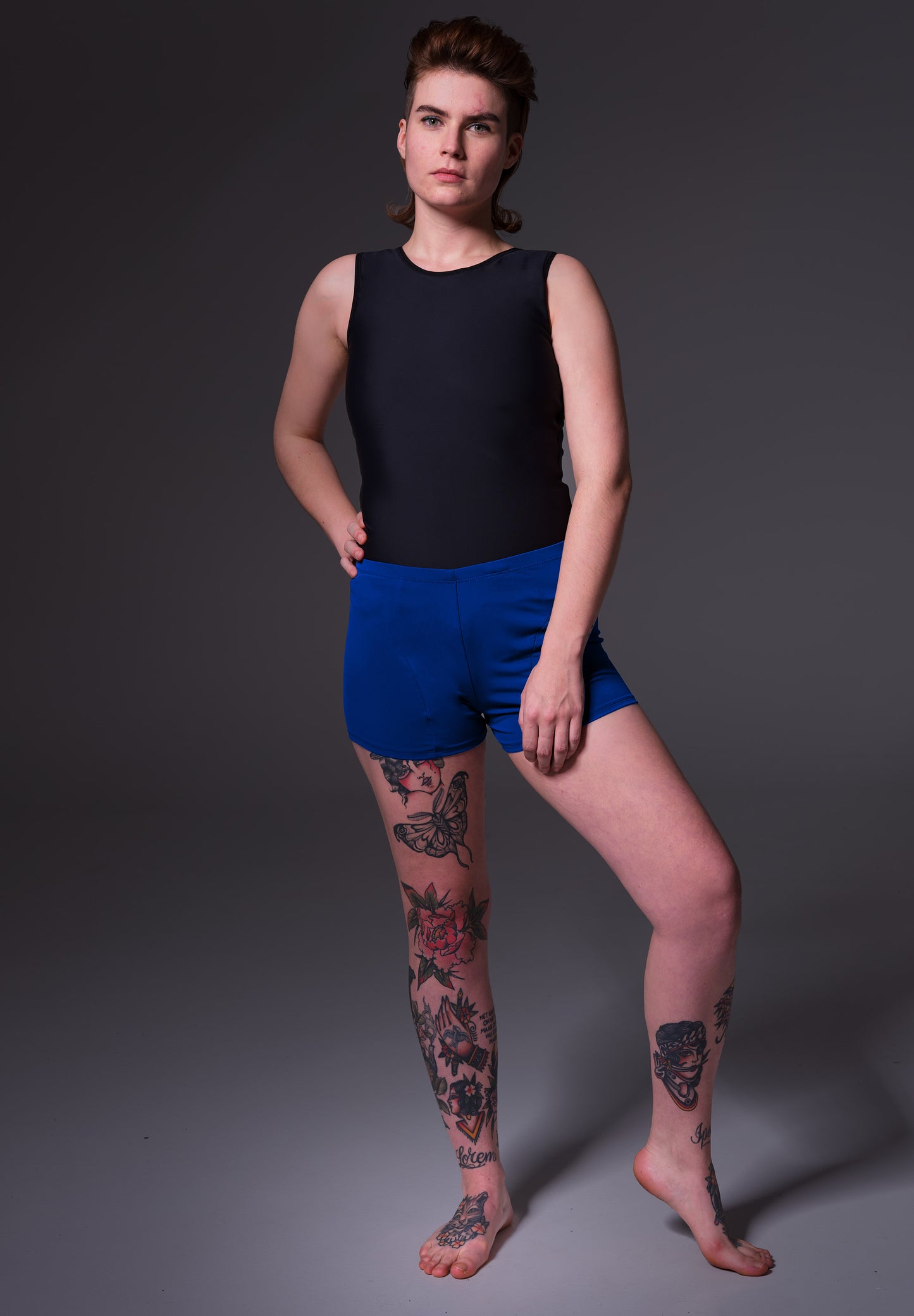 UNTAG FtM trans masc non binary swim cobalt blue swim shorts packing model front 2