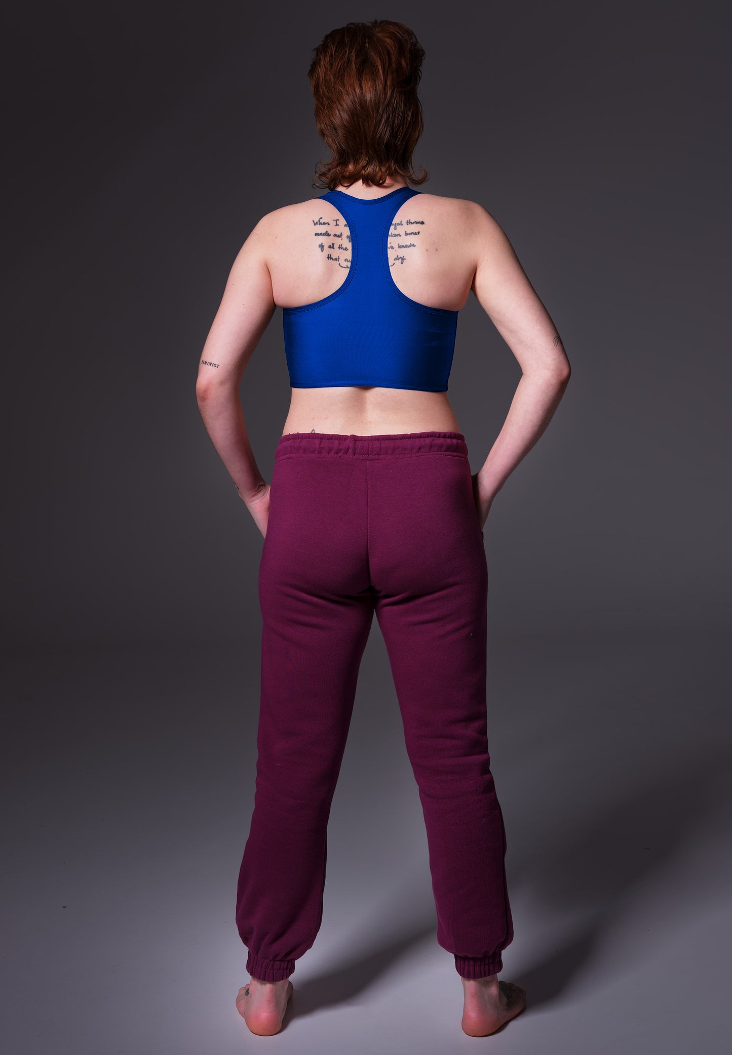 UNTAG FtM trans masc non binary swim cobalt blue chest binder tank top model back