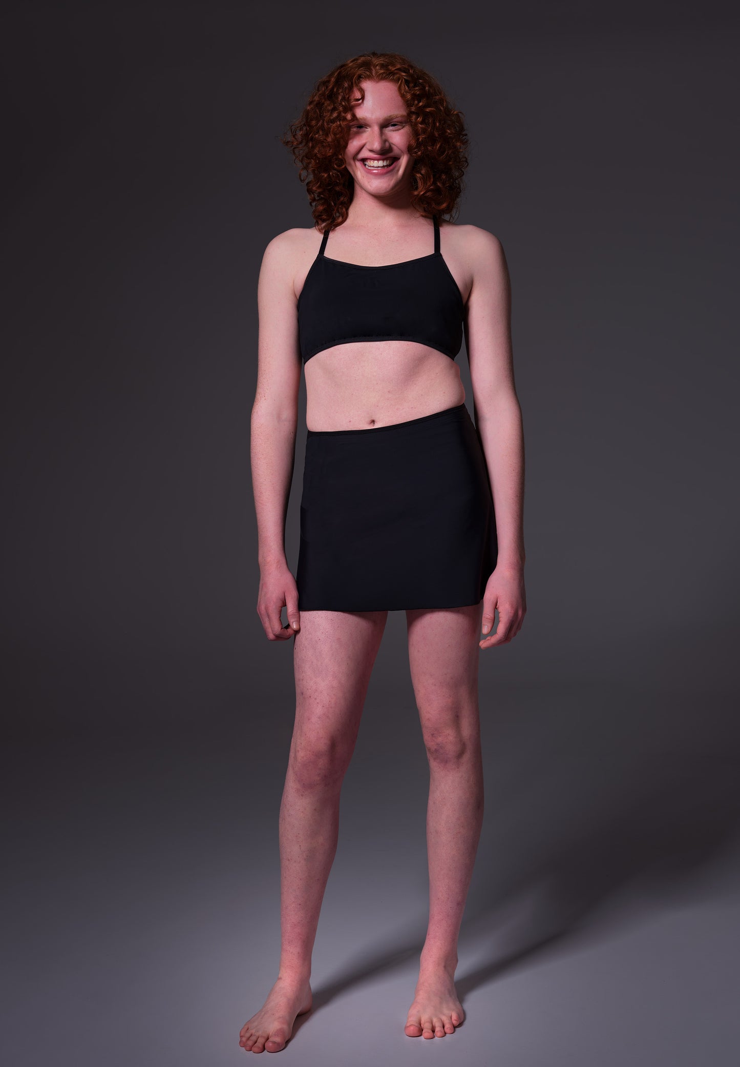 Model Sweder, front shot of her, wearing the Swim Skirt black
