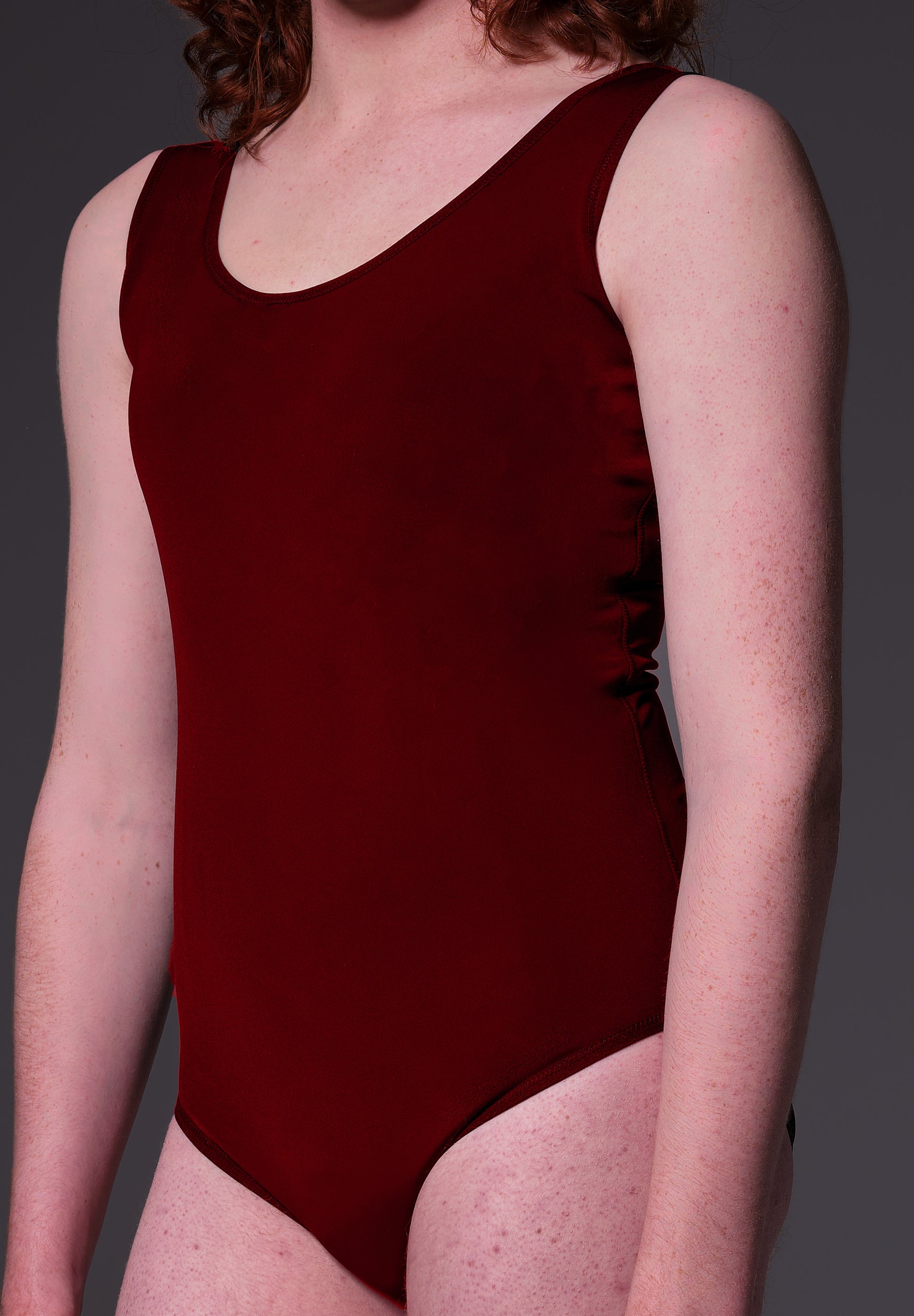 MtF trans swimsuit burgundy color tucking side model shot