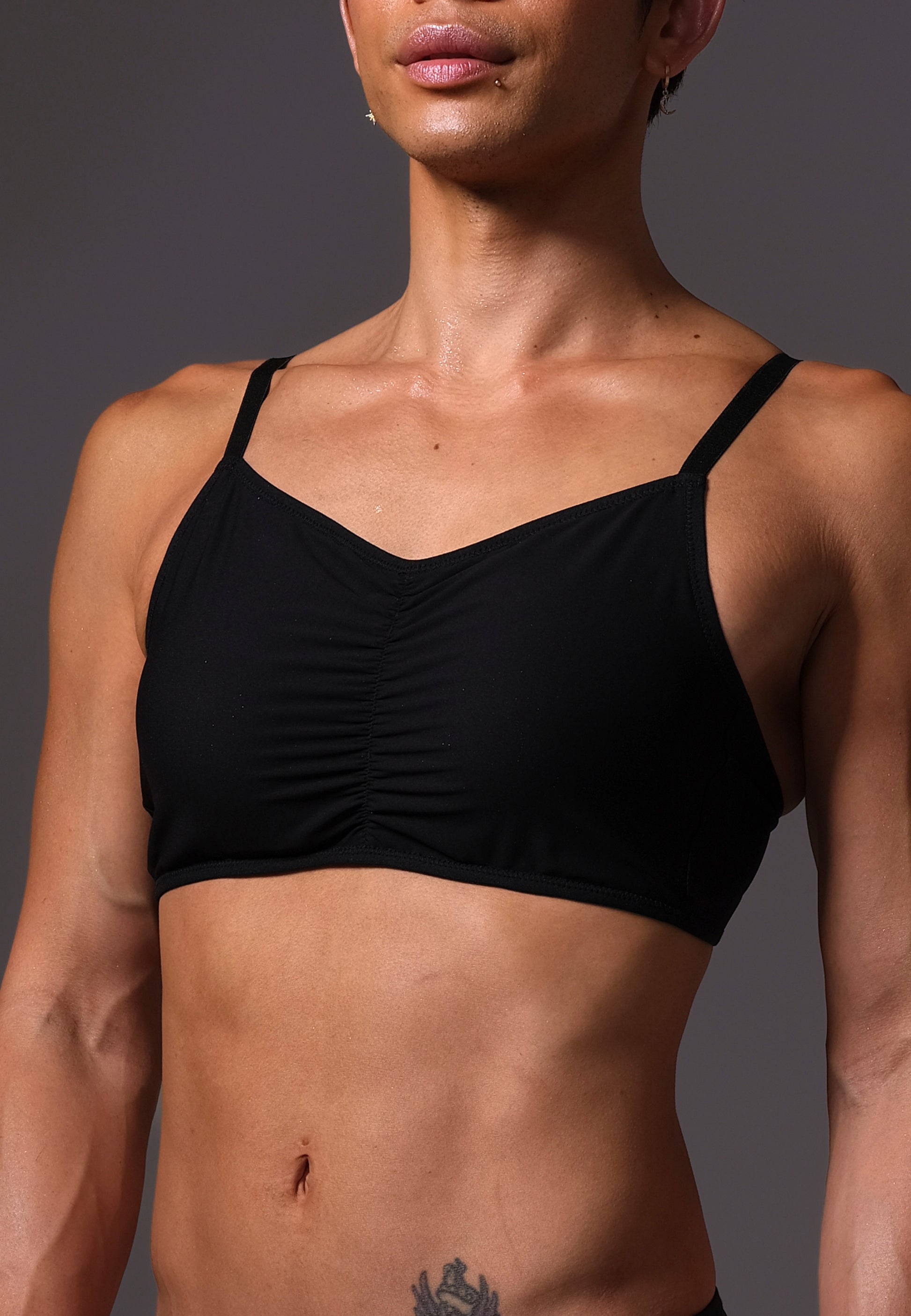 MtF trans femme UNTAG black bikini top front close up model