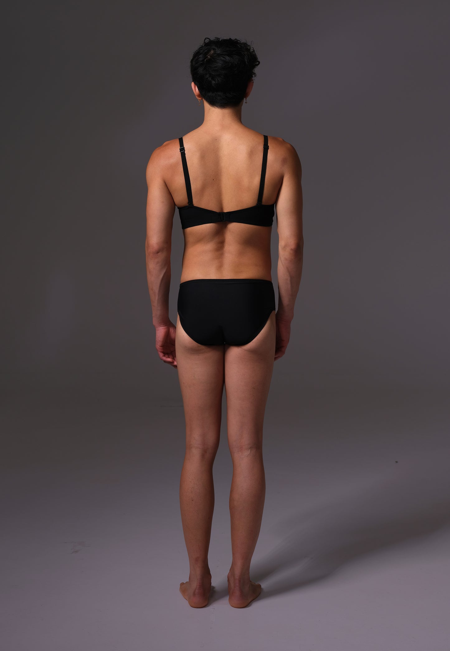 Tucking Bikini Slip schwarz