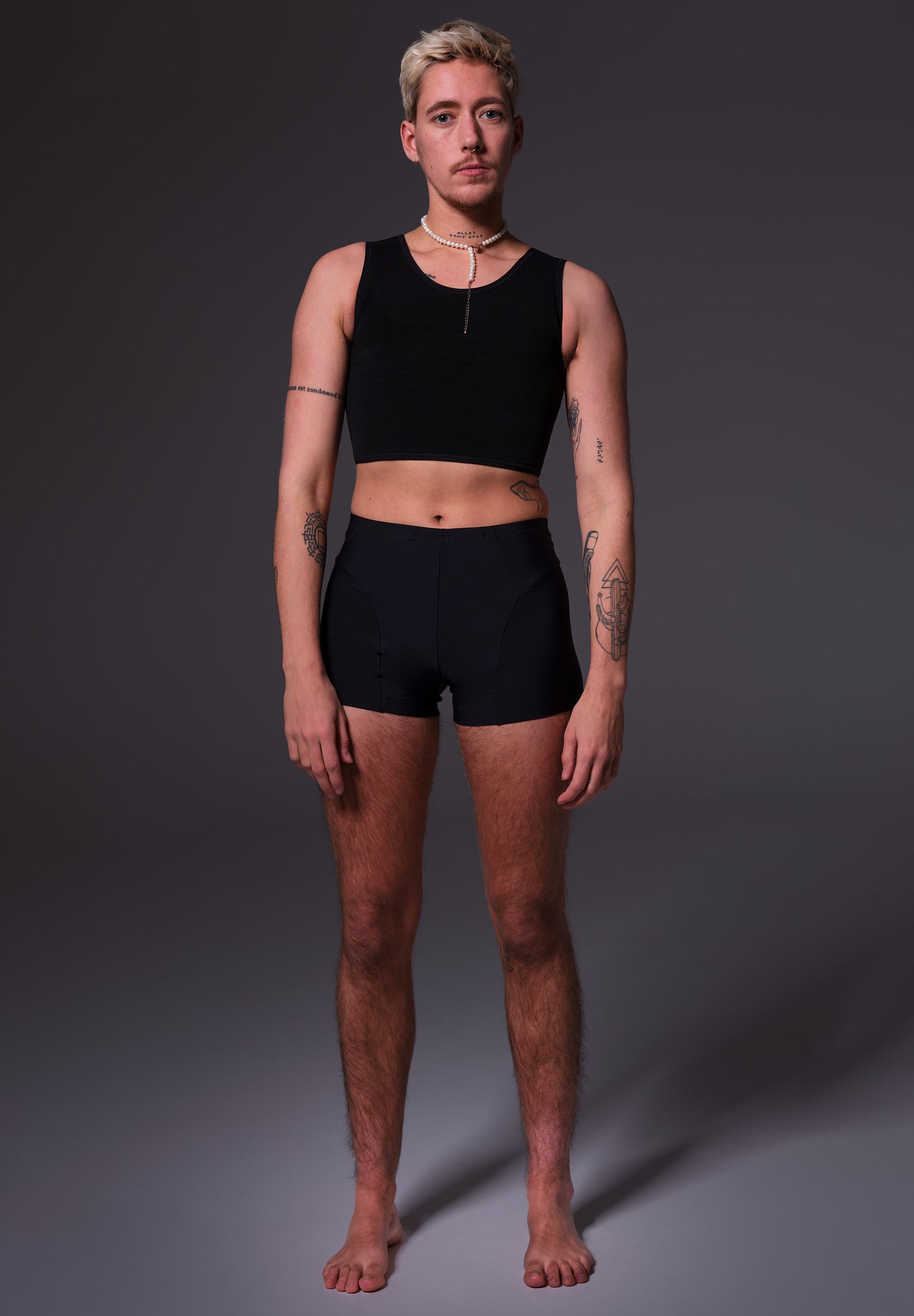 Basic Swim Binder black worn by Mees, front view