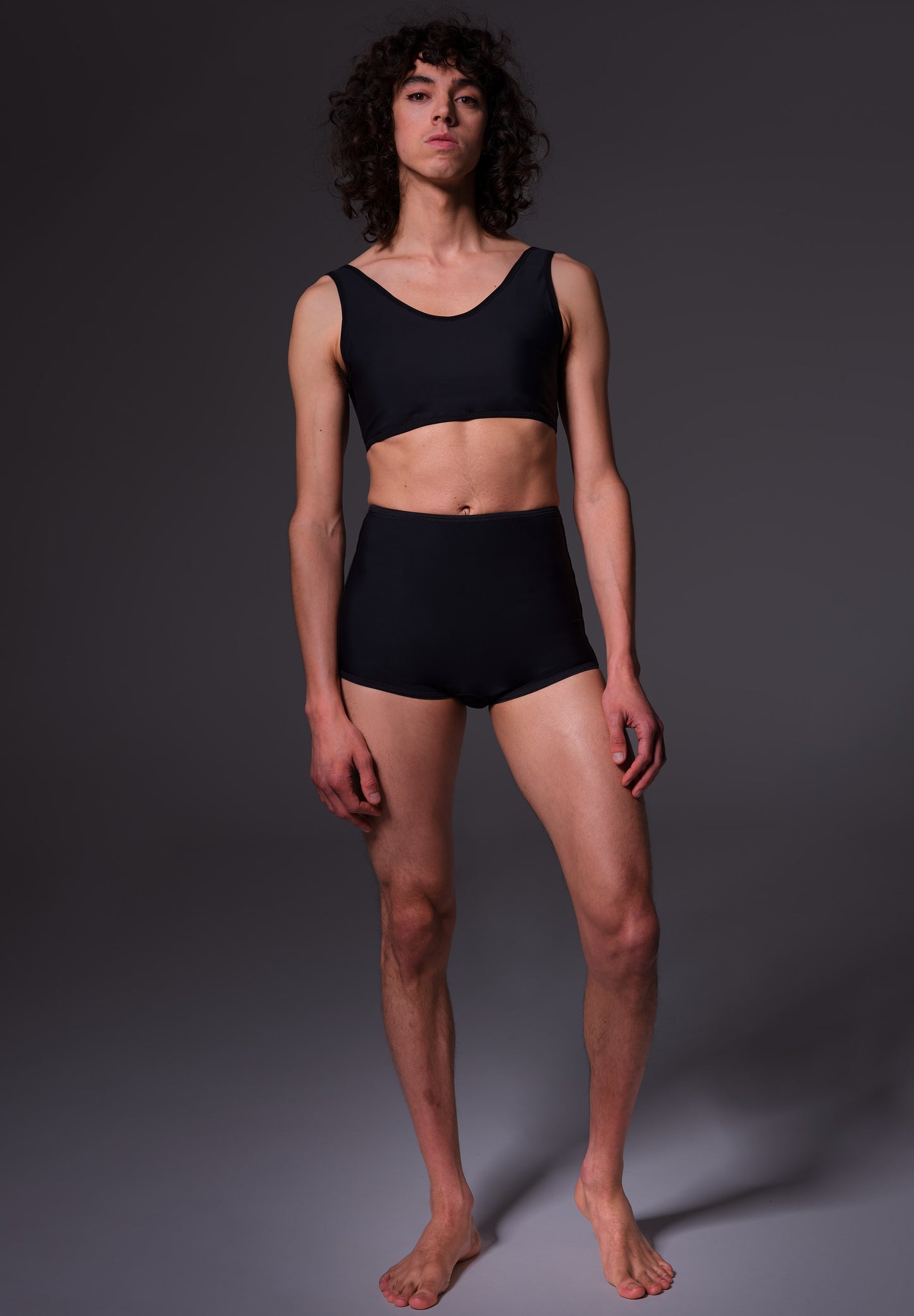 Model Riah wearing the Bikini Short black, seen from the front