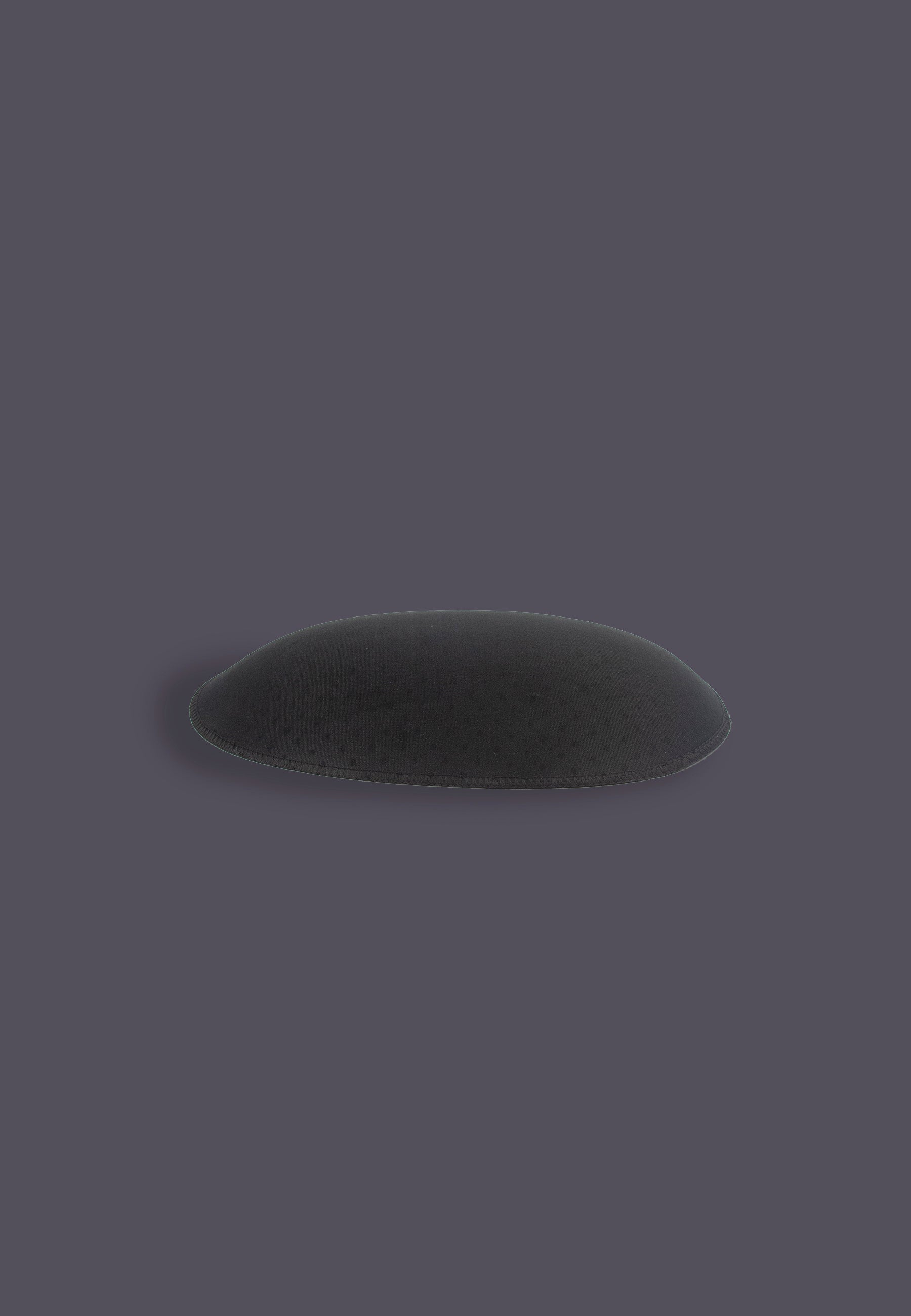 Foam Self-Adhesive Hippads black showing the curve and padding